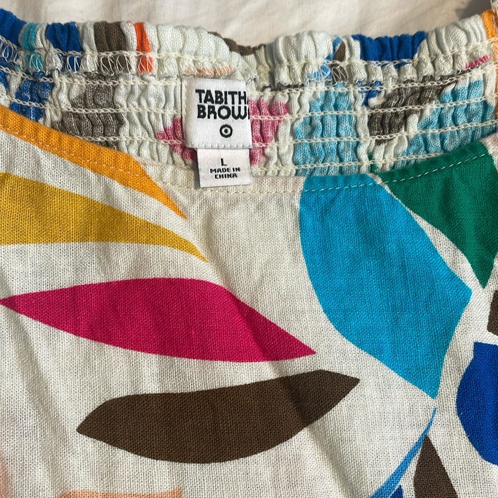 Tabitha Brown, colorful, puff sleeved, linen dress. Smocked back and pockets.
